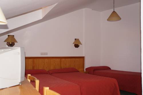 Imagen de la habitación del Hostal OYO Hostal La Posada. Foto 4