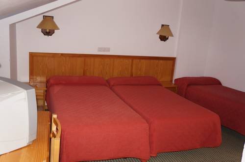 Imagen de la habitación del Hostal OYO Hostal La Posada. Foto 5