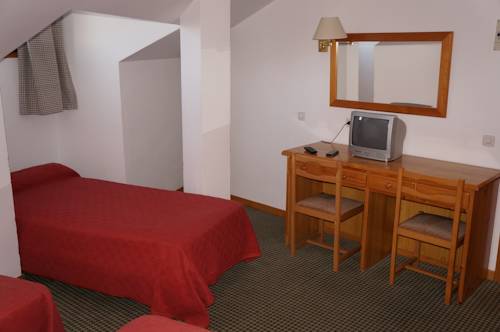 Imagen de la habitación del Hostal OYO Hostal La Posada. Foto 8