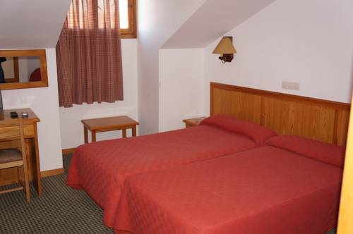 Imagen de la habitación del Hostal OYO Hostal La Posada. Foto 10