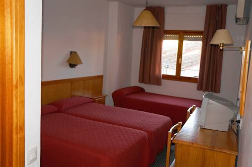 Imagen de la habitación del Hostal OYO Hostal La Posada. Foto 11