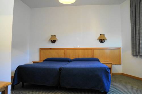 Imagen de la habitación del Hostal OYO Hostal La Posada. Foto 12