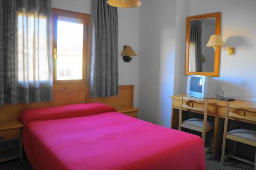 Imagen de la habitación del Hostal OYO Hostal La Posada. Foto 14