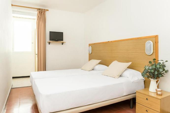 Imagen de la habitación del Hostal Olga, Sant Antoni de Calonge. Foto 11