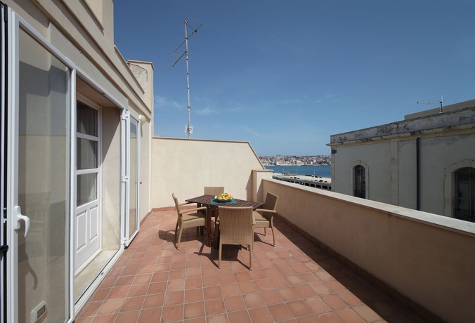 Imagen de los exteriores del Hostal Ortigia Mastrarua rooms. Foto 11