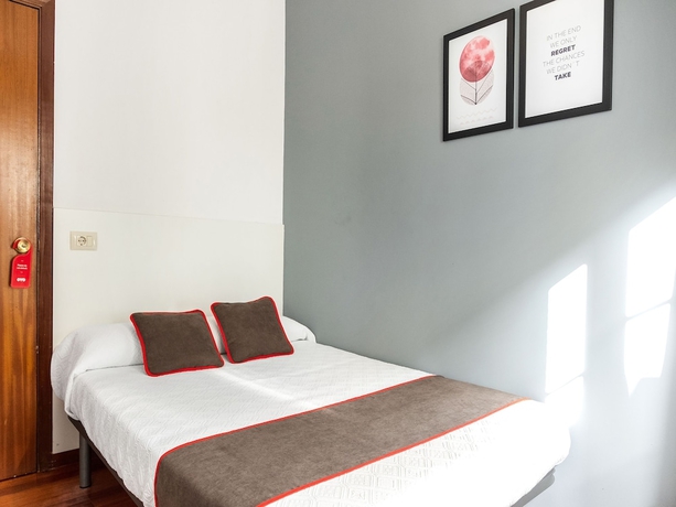 Imagen de la habitación del Hostal Oyo Hospedaje La Tita. Foto 10