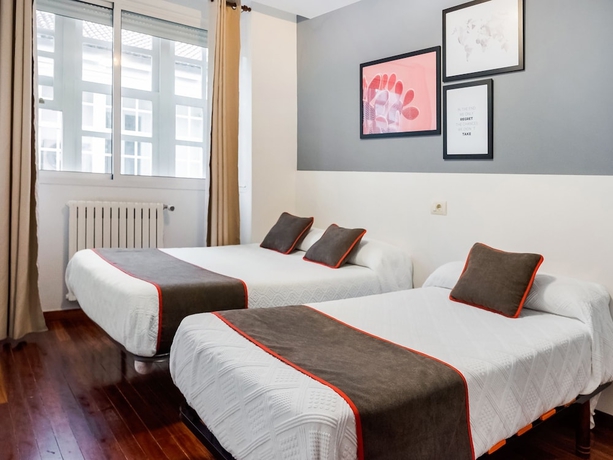 Imagen de la habitación del Hostal Oyo Hospedaje La Tita. Foto 16