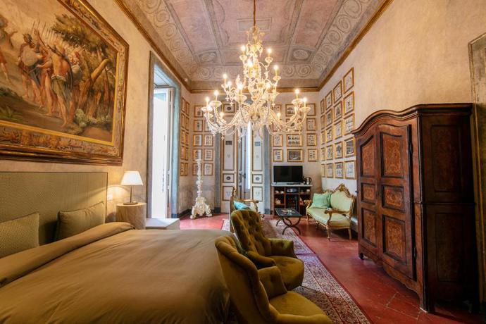 Imagen de la habitación del Hostal Palazzo Doria Napoli. Foto 9