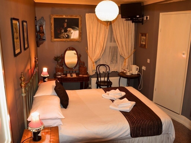 Imagen de la habitación del Hostal Palmerston Grange. Foto 14