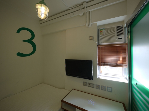 Imagen de la habitación del Hostal Panda's - Star Ferry. Foto 3