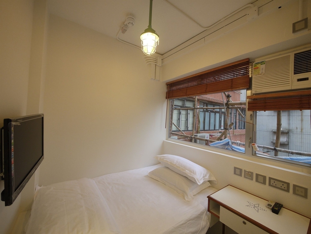 Imagen de la habitación del Hostal Panda's - Star Ferry. Foto 4