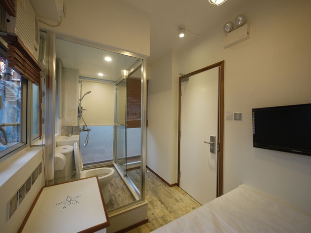 Imagen de la habitación del Hostal Panda's - Star Ferry. Foto 11