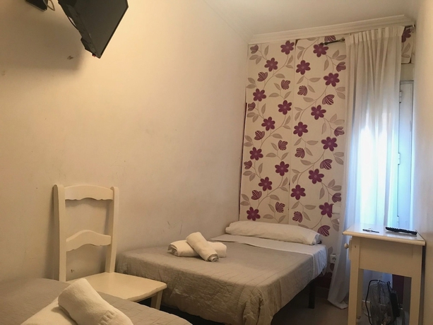 Imagen de la habitación del Hostal Pensión La Estrella. Foto 16