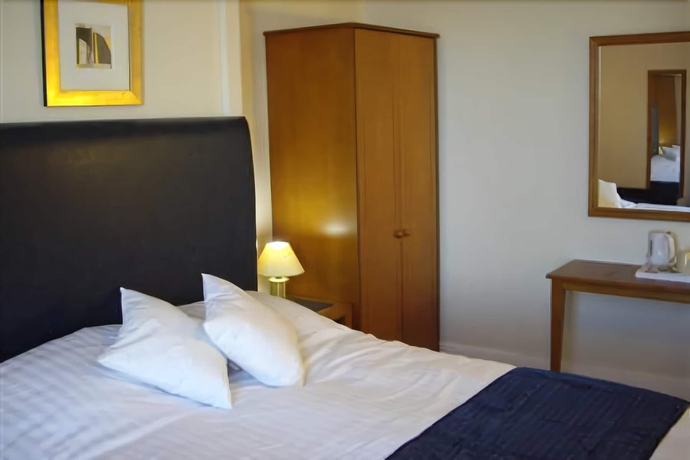 Imagen de la habitación del Hostal Pink Beach Guest House. Foto 4