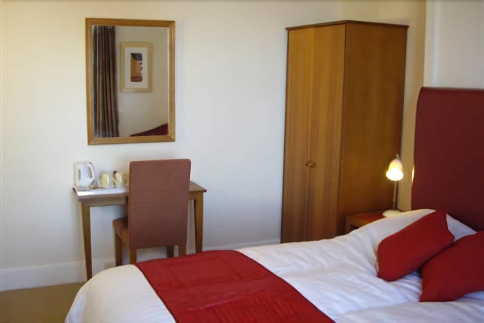 Imagen de la habitación del Hostal Pink Beach Guest House. Foto 5