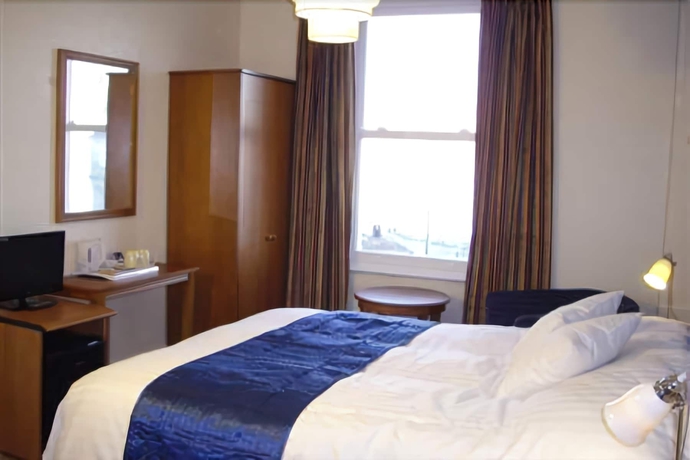 Imagen de la habitación del Hostal Pink Beach Guest House. Foto 8