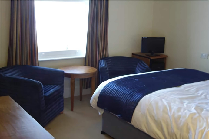 Imagen de la habitación del Hostal Pink Beach Guest House. Foto 9