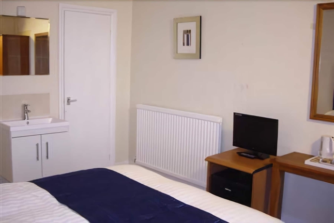 Imagen de la habitación del Hostal Pink Beach Guest House. Foto 10