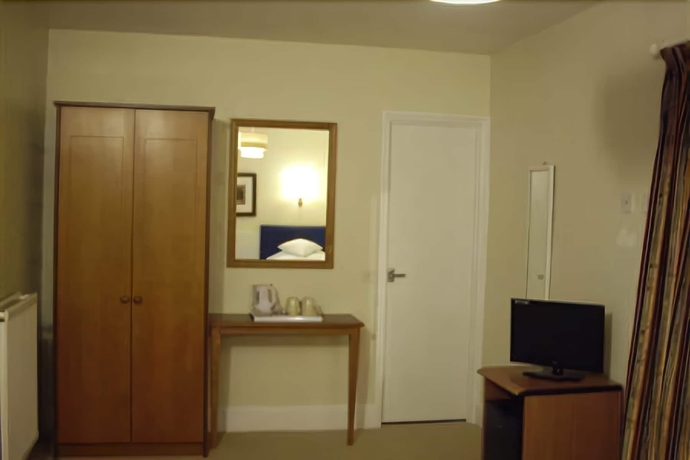 Imagen de la habitación del Hostal Pink Beach Guest House. Foto 11