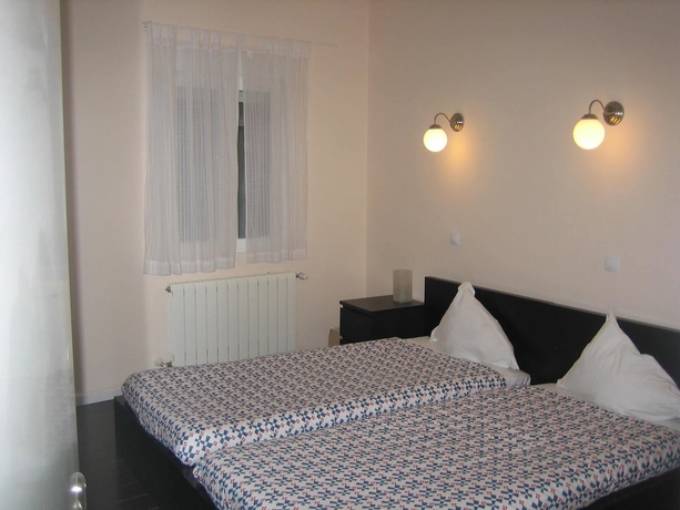 Imagen de la habitación del Hostal Pizarro, Malasa&ntilde;a. Foto 4