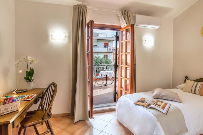 Imagen de la habitación del Hostal Plaza Rooms Ciampino. Foto 13