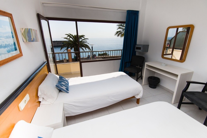 Imagen de la habitación del Hostal Port Corona. Foto 13