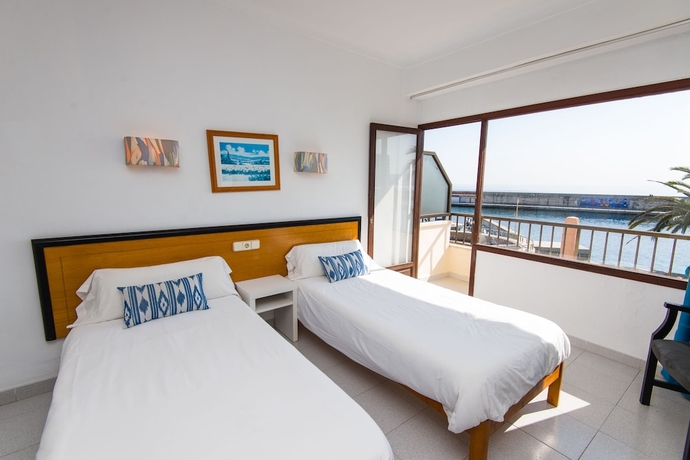 Imagen de la habitación del Hostal Port Corona. Foto 14
