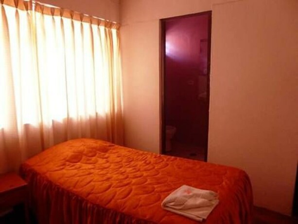 Imagen de la habitación del Hostal Porta Cusco. Foto 31