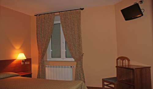 Imagen de la habitación del Hostal Prada Borges. Foto 9