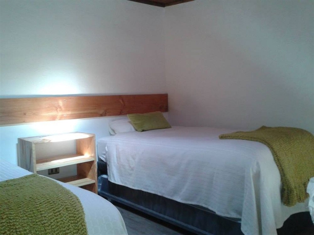 Imagen de la habitación del Hostal Pueblo de Tierra. Foto 7