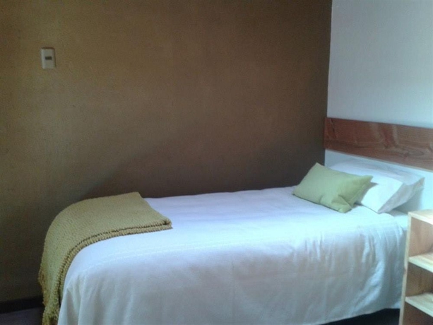 Imagen de la habitación del Hostal Pueblo de Tierra. Foto 11