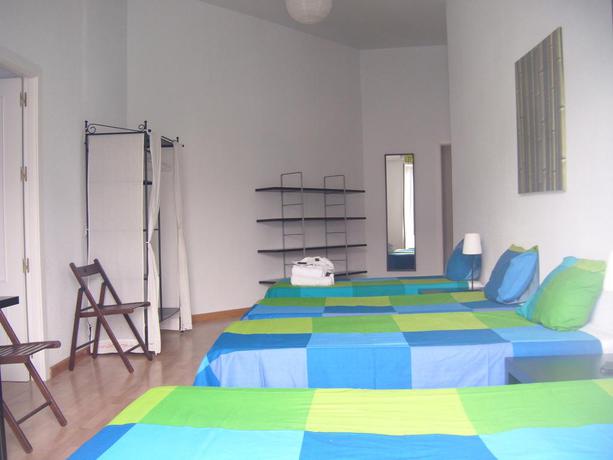 Imagen de la habitación del Hostal Puerta del Sol Rooms. Foto 7