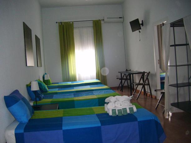 Imagen de la habitación del Hostal Puerta del Sol Rooms. Foto 8