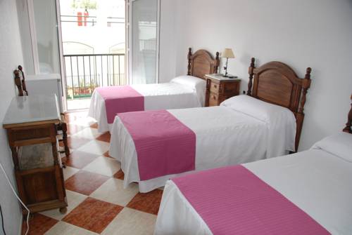 Imagen de la habitación del Hostal Puerto Lepe. Foto 6