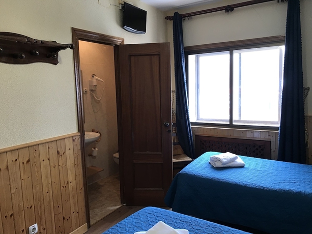 Imagen de la habitación del Hostal Puerto, Somosierra. Foto 7
