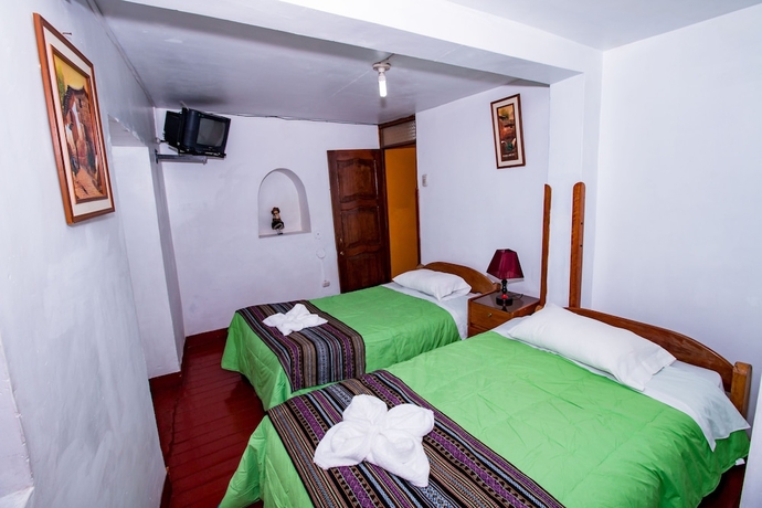 Imagen de la habitación del Hostal Pumakiru. Foto 13