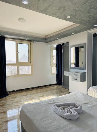 Imagen de la habitación del Hostal Pyramids Terrace INN. Foto 7