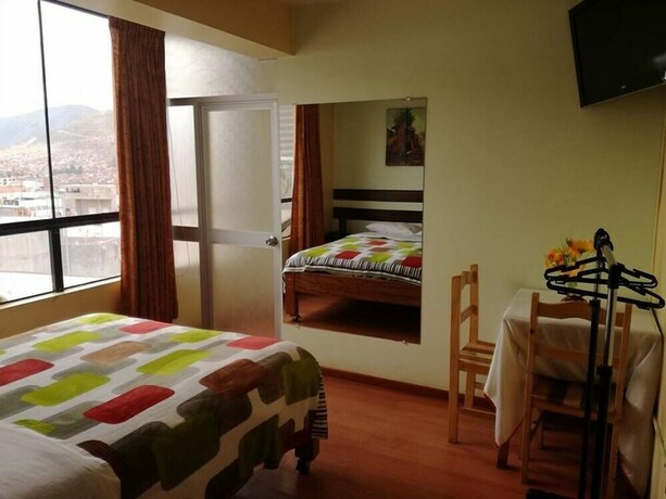 Imagen de la habitación del Hostal Qo&ntilde;icha Wasi. Foto 12