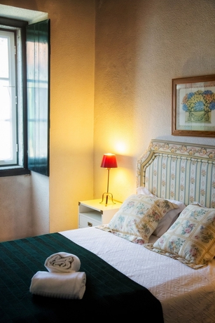 Imagen de la habitación del Hostal Quinta da Praia das Fontes. Foto 3