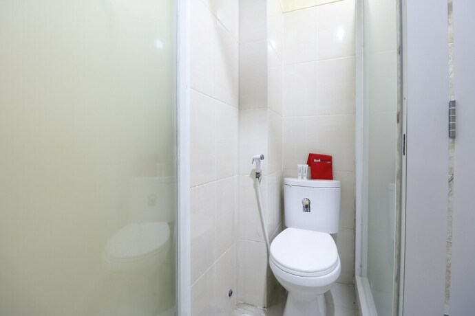 Imagen de la habitación del Hostal Reddoorz Near Itc Cempaka Mas. Foto 21