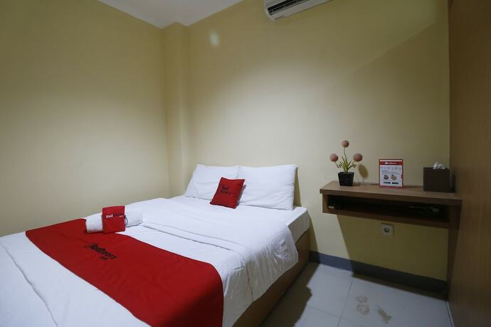 Imagen de la habitación del Hostal Reddoorz Near Itc Cempaka Mas. Foto 22