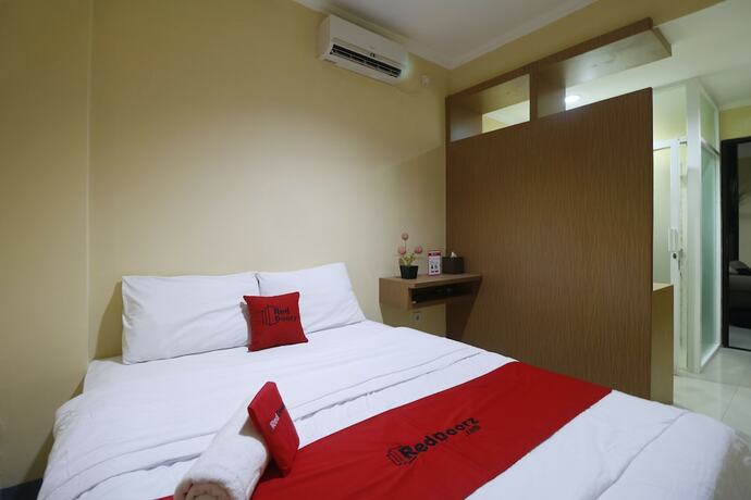 Imagen de la habitación del Hostal Reddoorz Near Itc Cempaka Mas. Foto 29