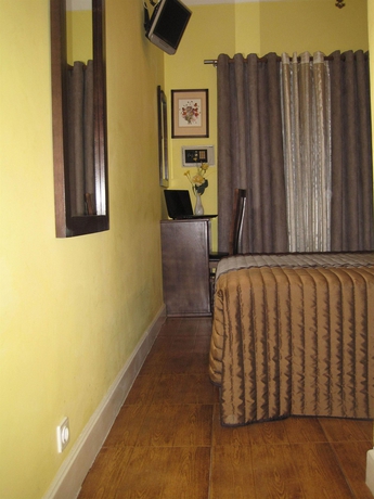 Imagen de la habitación del Hostal Residencial Faria Guimarães. Foto 4