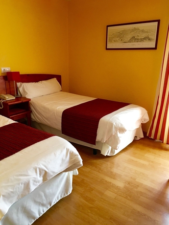 Imagen de la habitación del Hostal Restaurante Puerta Del Alcázar. Foto 9