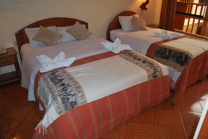 Imagen de la habitación del Hostal San Blas Plaza Inn. Foto 3