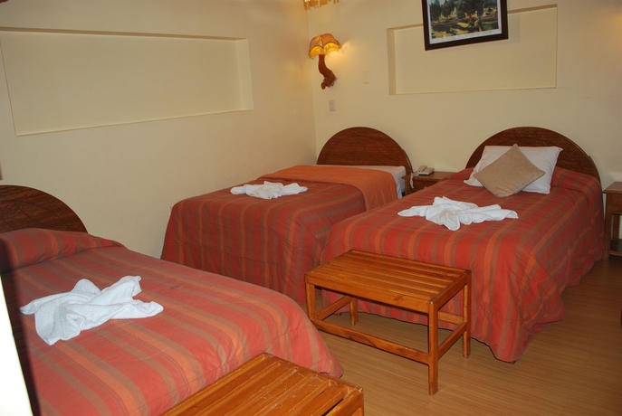 Imagen de la habitación del Hostal San Blas Plaza Inn. Foto 4