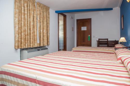 Imagen de la habitación del Hostal San Cayetano. Foto 9