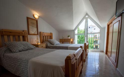 Imagen de la habitación del Hostal Sango Sierra de las Nieves. Foto 6