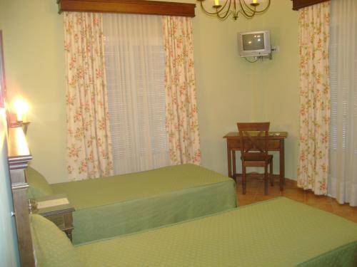 Imagen de la habitación del Hostal Santa Cruz, Los Palacios y Villafranca. Foto 3
