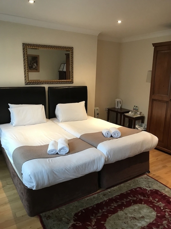 Imagen de la habitación del Hostal Sheil Suites. Foto 10